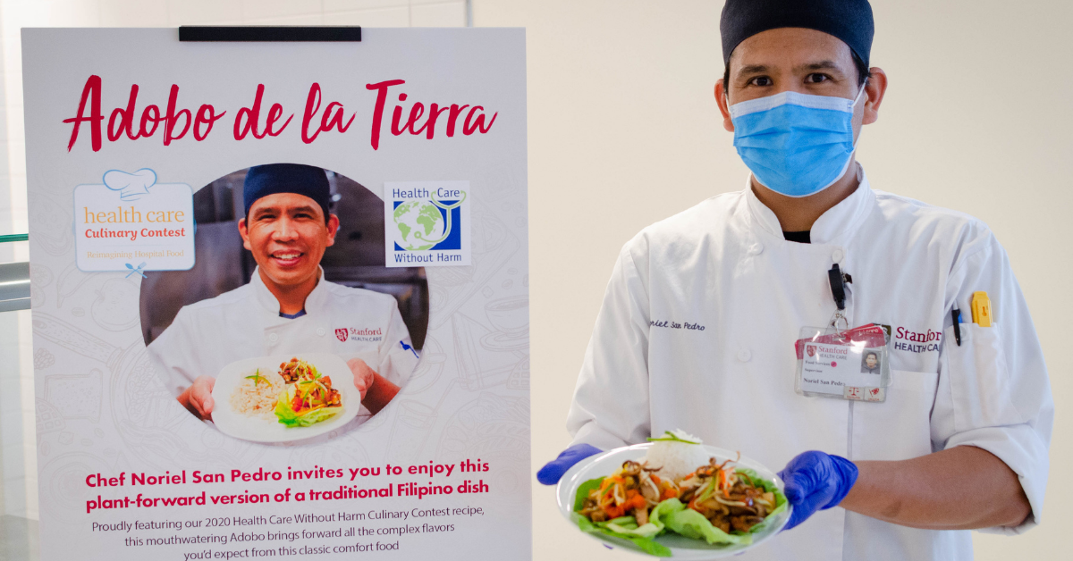 Noriel, his dish, and a sign celebrating both