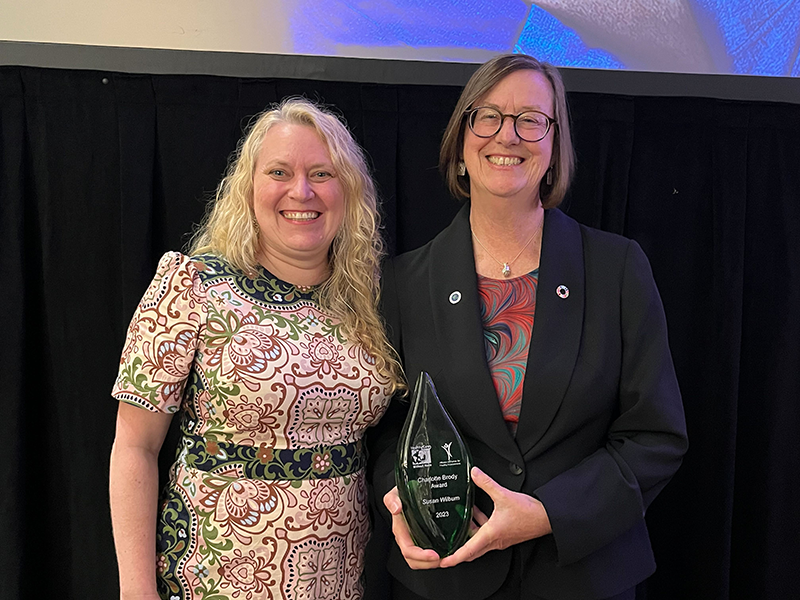 Katie Huffling and Charlotte Brody award winner Sarah Wilburn pose during the CleanMed conference