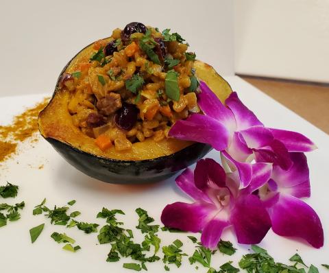 Barley and curried vegetable stuffed acorn squash