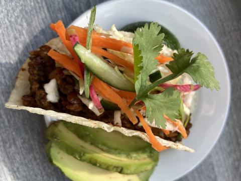 Walnut lentil tacos with honey lime slaw