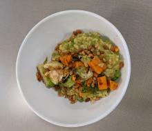 Pea risotto with balsamic roasted brussel sprouts, sweet potato, and candied pine nuts
